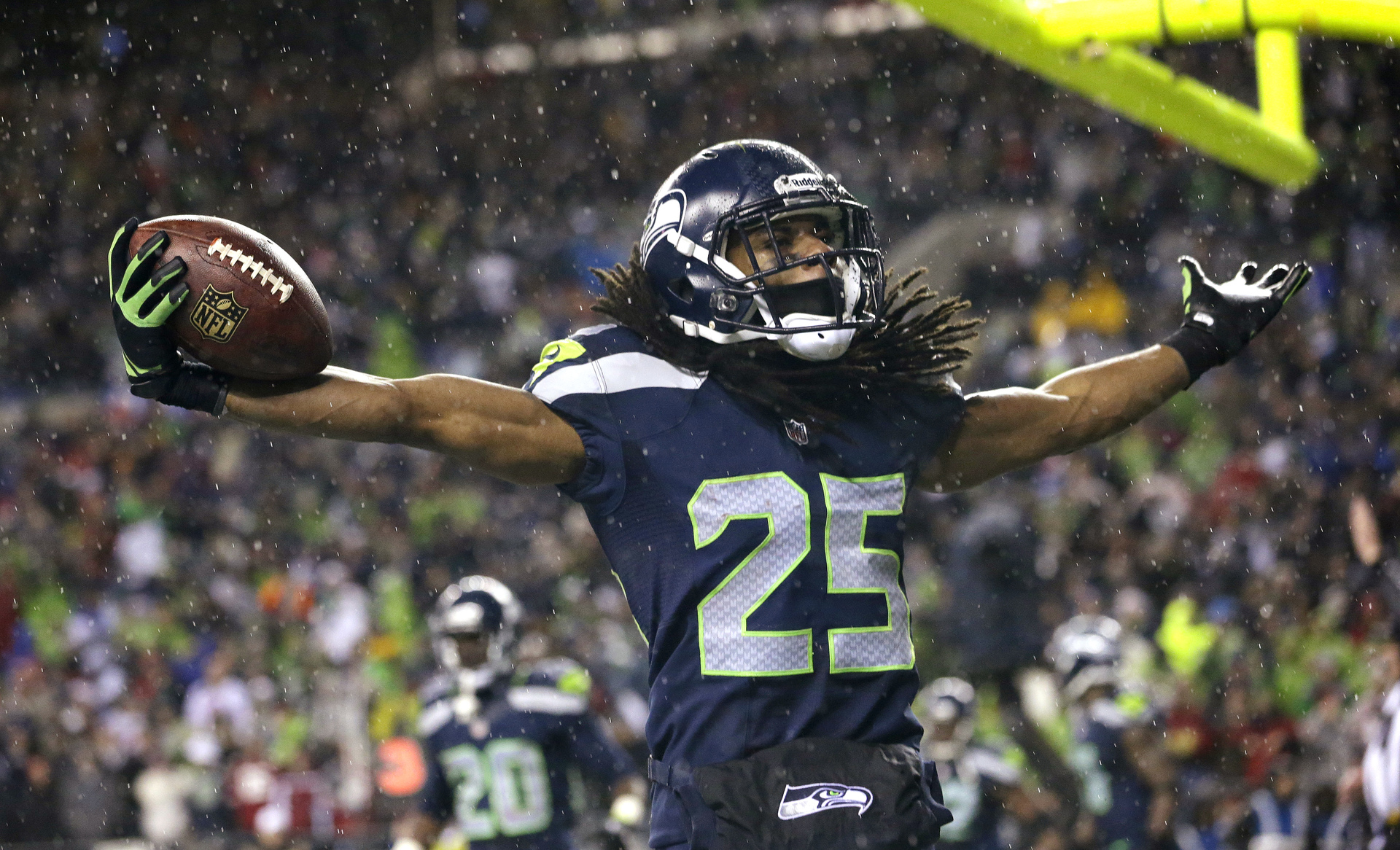 Seattle Seahawks' Richard Sherman motions to fans after intercepting in the end zone against the San Francisco 49ers in the second half of an NFL football game, Sunday, Dec. 23, 2012, in Seattle. The Seahawks won 42-13. (AP Photo/Elaine Thompson)